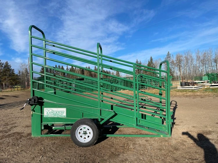 Portable steel bison loading chute that's painted green